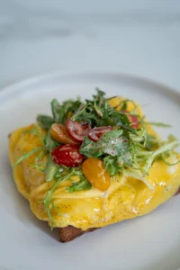 Creamy Scrambled Eggs on Toast is served for having breakfast